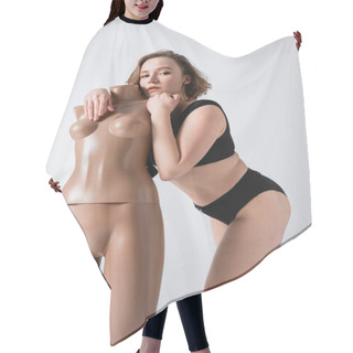 Personality  Overweight Young Woman In Black Swimsuit Leaning On Plastic Mannequin Isolated On White  Hair Cutting Cape