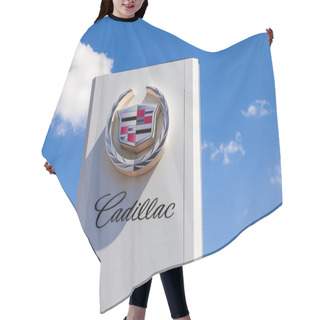 Personality  SAMARA, RUSSIA - MAY 24, 2014: The Emblem Cadillac Over Blue Sky Hair Cutting Cape