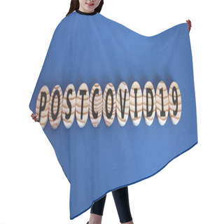 Personality  The Word 'postcovid19' On Wooden Circles On Beautiful Blue Background, Copy Space. Covid-19 Pandemic And Medical Concept. Hair Cutting Cape