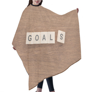 Personality  'goals' Word Made Of Wooden Blocks On Wooden Tabletop, Goal Setting Concept Hair Cutting Cape