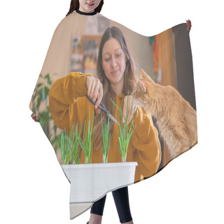 Personality  A Woman In A Mustard-colored Sweater Carefully Trims Green Onions In A White Planter As Her Ginger Cat Looks On With Interest, A Serene Gardening Activity Hair Cutting Cape