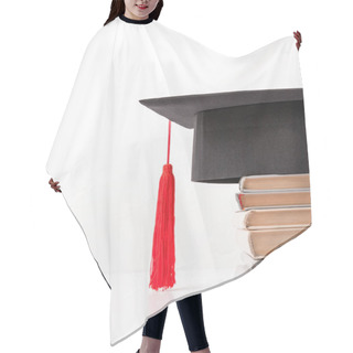 Personality  Cropped View Of Academic Cap On Pile Of Books Isolated On White Hair Cutting Cape