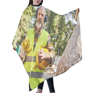 Personality  Hardworking Cottage Builder In Safety Gloves And Vest Posing With Headphones And Helmet On Site Hair Cutting Cape
