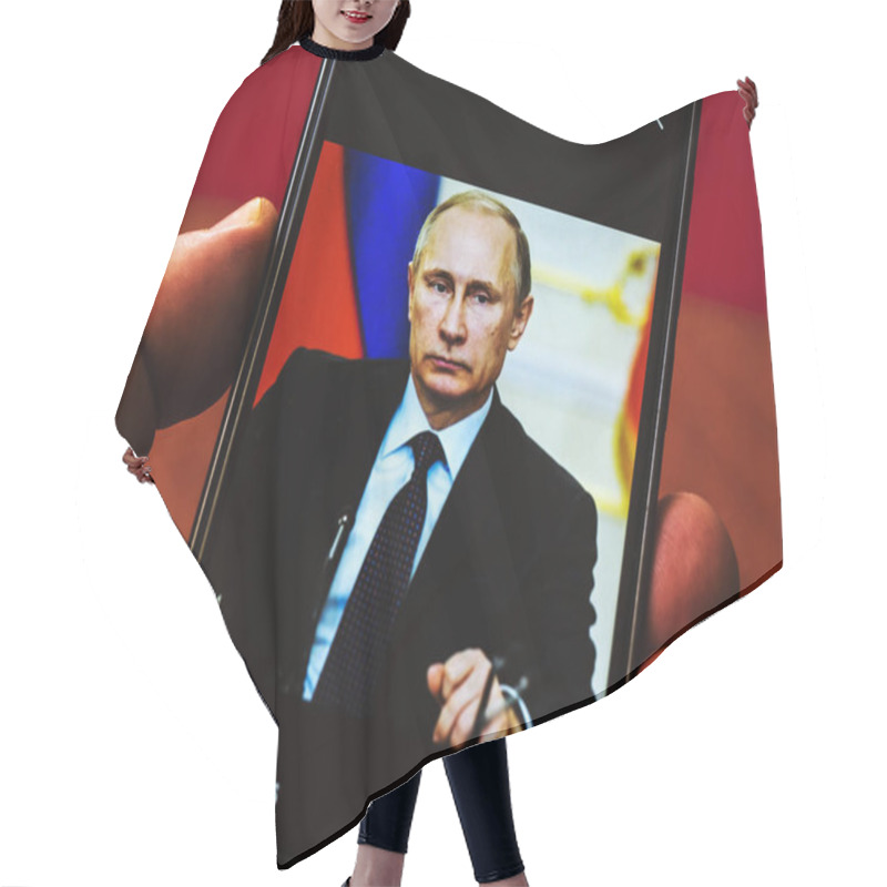 Personality  KIEV, UKRAINE - Oct 7, 2018: Portrait Of President  Vladimir Putin  On Facebook Account Seen Displayed On A Smart Phone Hair Cutting Cape