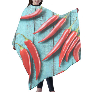 Personality  Top View Of Red Yummy Chili Peppers On Blue Wooden Table Hair Cutting Cape