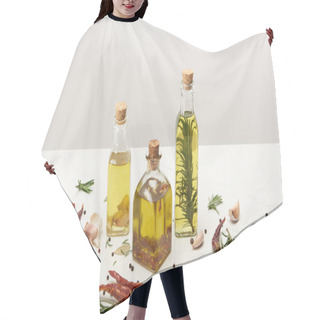 Personality  Various Bottles Of Oil Flavored With Different Spices And Rosemary On White Surface Hair Cutting Cape