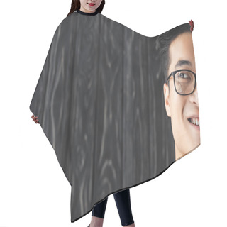 Personality  Cropped View Of Smiling Asian Man In Glasses Looking Away On Wooden Background  Hair Cutting Cape