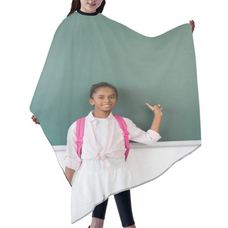 Personality  African American Schoolgirl Pointing With Finger At Chalkboard In Classroom  Hair Cutting Cape