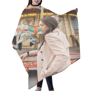 Personality  Young Woman In Beige Trench Coat Standing Near Carousel In Amusement Park Hair Cutting Cape