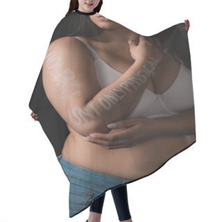 Personality  Cropped Partial Shot Of Plus Size Model In White Bra With Lettering Violence Is Not Only Physical On Hand Isolated On Black  Hair Cutting Cape