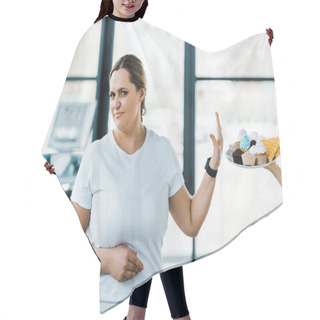Personality  Cropped View Of Man Holding Plate With Tasty Pastry Near Overweight Woman Showing No Sign Hair Cutting Cape