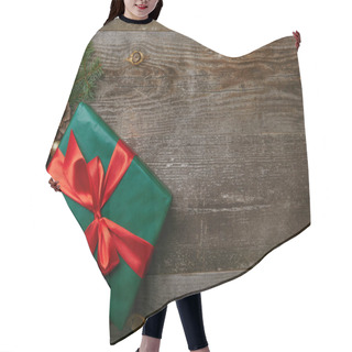 Personality  Top View Of Wrapped Green Present With Red Ribbon And Christmas Toys On Wooden Background Hair Cutting Cape
