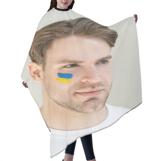 Personality  Portrait Of Patriotic Man With Unkrainian Flag Painted On Face Isolated On Grey Hair Cutting Cape