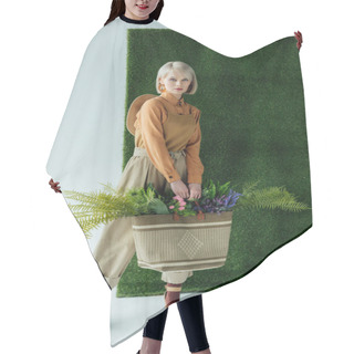 Personality  Beautiful Stylish Girl Looking At Camera While Holding Bag With Fern And Flowers On White With Green Grass  Hair Cutting Cape