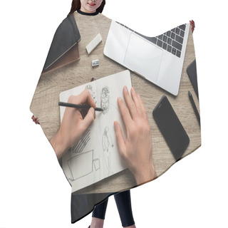 Personality  Top View Of Mans Hands Drawing On Album And Smartphone Next To Laptop On Wooden Table Hair Cutting Cape