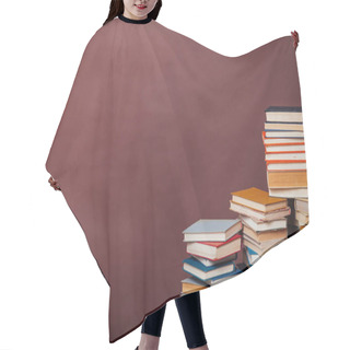 Personality  Stacks Of Educational Books Against The Background Of The Wall In The Library Hair Cutting Cape