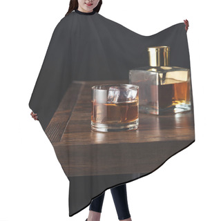 Personality  Close-up View Of Glass And Bottle Of Whisky On Dark Wooden Table Isolated On Black   Hair Cutting Cape