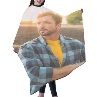Personality  Rancher In Plaid Shirt Looking Away While Standing On Field With Bucket Hair Cutting Cape