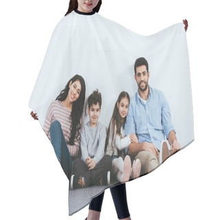 Personality  Cheerful Hispanic Family Smiling While Sitting On Floor Near White Wall  Hair Cutting Cape