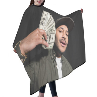 Personality  Bearded Indian Hip Hop Singer In Cap Holding Dollar Banknotes Isolated On Black  Hair Cutting Cape