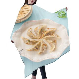 Personality  Gyoza Dumplings With Duck Cooked In Bamboo Steamer Served On Plate With Soy Sauce And Sesame Seeds On Blue Background, Top View Hair Cutting Cape