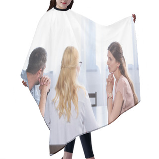 Personality  Rear View Of Female Psychiatrist Talking To Couple On Therapy Session In Office  Hair Cutting Cape