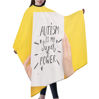 Personality  Cropped View Of Person Holding Sheet Of Paper With Autism Is My Super Power Inscription On Yellow Hair Cutting Cape
