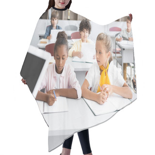 Personality  Cropped View Of Teacher Holding Digital Tablet With Blank Screen Near Multicultural Pupils Writing In Notebooks Hair Cutting Cape