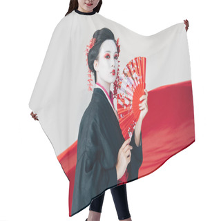 Personality  Beautiful Geisha In Black Kimono With Hand Fan And Red Cloth On Background Isolated On White Hair Cutting Cape