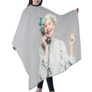 Personality  Happy Senior Woman Talking By Vintage Phone And Pointing Up Isolated On Grey Hair Cutting Cape