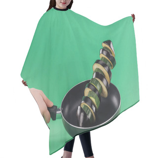 Personality  Cropped View Of Woman Holding Frying Pan With Sliced Fresh Zucchini And Aubergine On Green Background Hair Cutting Cape