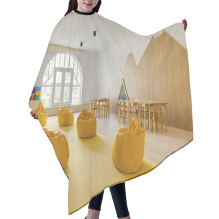 Personality  Yellow Bean Bag Chairs And Wooden Tables In Kindergarten Playing Room Hair Cutting Cape