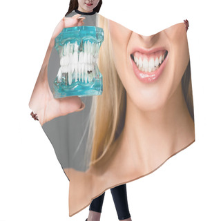 Personality  Cropped View Of Naked Woman Showing Teeth And Holding Jaw Model Isolated On Grey Hair Cutting Cape