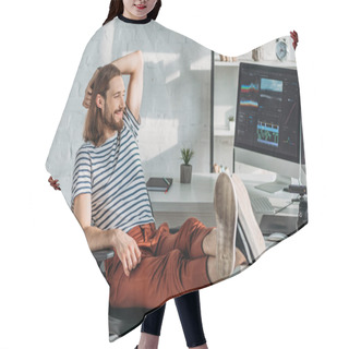 Personality  Happy Filmmaker Resting Near Computer Monitors In Studio  Hair Cutting Cape