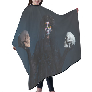 Personality  Front View Of Woman In Halloween Makeup And Black Costume Standing With Skulls On Dark Blue Background Hair Cutting Cape