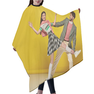 Personality  Cheerful Man In Glasses Catching Falling Woman, Young Couple, Funny, Yellow Backdrop, Emotional Hair Cutting Cape