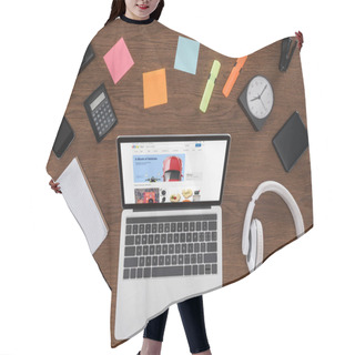 Personality  Top View Of Wooden Table With Empty Textbook, Smartphone, Photo Camera And Laptop With Ebay  On Screen Hair Cutting Cape