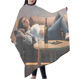 Personality  Drunk Woman Lying On Sofa With Glass Of Wine Near Bottles On Floor And Table  Hair Cutting Cape