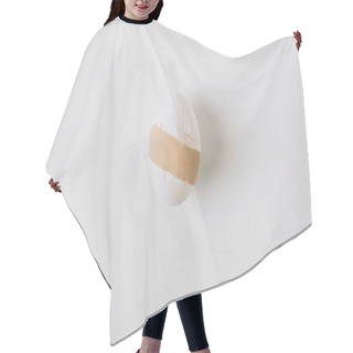 Personality  Broken White Egg With Medical Plaster Laying On White Background Hair Cutting Cape
