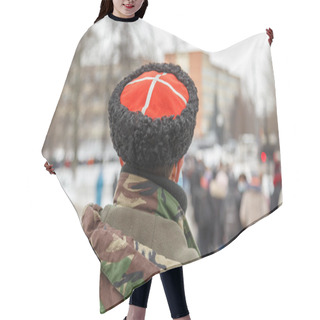Personality  Man In Camouflage Jacket And Cossack Hat With White Cross On Red Watching Blurry Crowd Of People Hair Cutting Cape