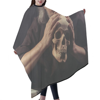 Personality  Cropped View Of Philosopher Holding Skull Near Blurred Bible Isolated On Black Hair Cutting Cape