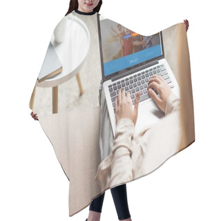 Personality  Cropped Shot Of Woman At Home Sitting On Couch And Using Laptop With Couchsurfing Website Homepage On Screen Hair Cutting Cape