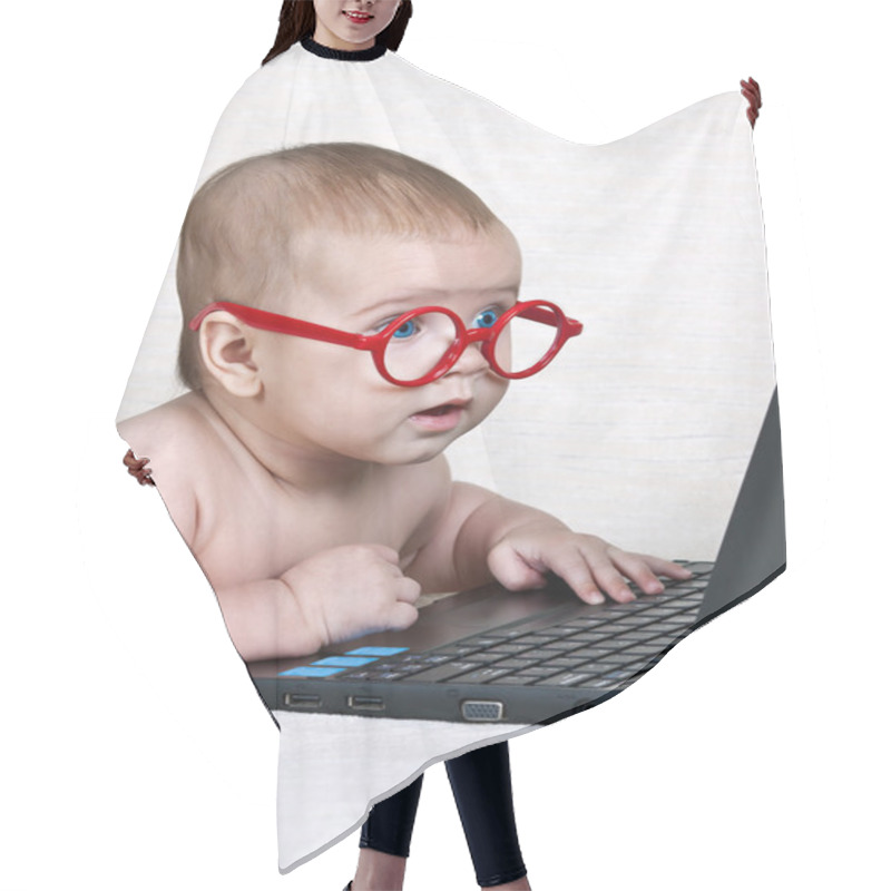 Personality  Funny kid in the glasses with a netbook hair cutting cape