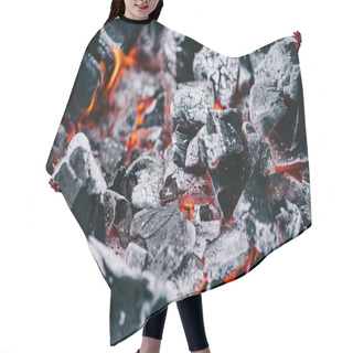 Personality  Selective Focus Of Hot Burning Coals In White Ash Hair Cutting Cape