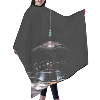 Personality  Fortune Telling Stone Above Crystal Ball On Black Velvet Cloth Isolated On Black Hair Cutting Cape
