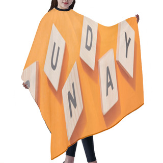 Personality  Panoramic Shot Of Wooden Cubes With Letters On Orange Surface Hair Cutting Cape