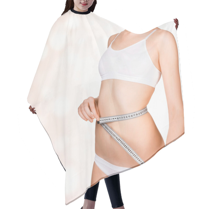 Personality  Woman taking measurements of her body hair cutting cape