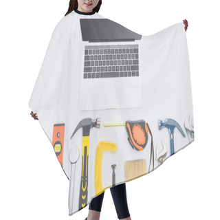 Personality  Top View Of Laptop With Various Instruments Lying On White Hair Cutting Cape
