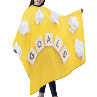 Personality  Crumbled Paper Balls Over 'goals' Word Made Of Wooden Blocks On Yellow Background, Goal Setting Concept Hair Cutting Cape