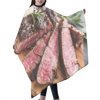 Personality  Medium Rare Ribeye Steak With Herbs And A Piece Of Butter On The Hair Cutting Cape